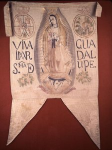 Estandarte de la Virgen de Guadalupe, llamada por los católicos "Reina de México y emperatriz de América"